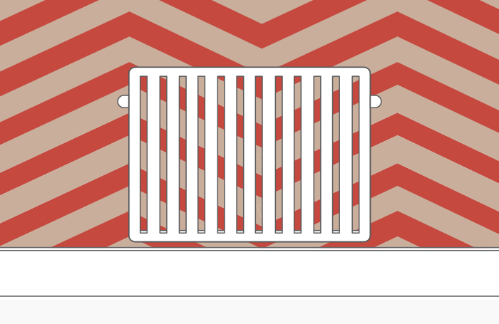 Le radiateur est ajouré et laisse entrevoir le mur
