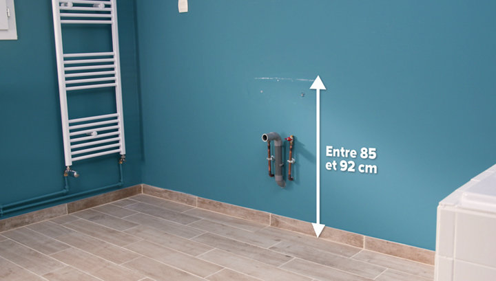 Poser un meuble de salle de bains